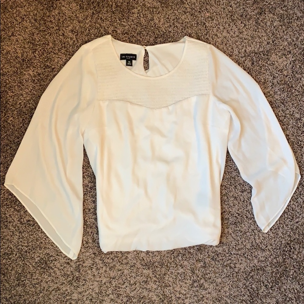 White flowy blouse